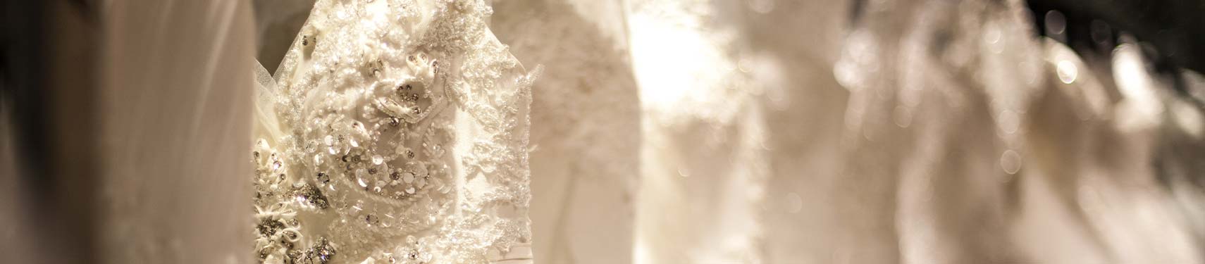 wedding gowns on rack